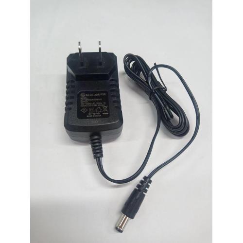 A bharrachd air an adanter AC-DC