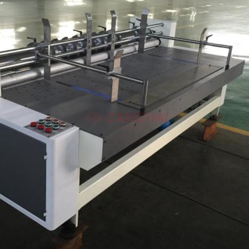 Automatic paper partition slotting machine