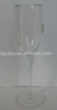 Man blown transparent glass champagne flute