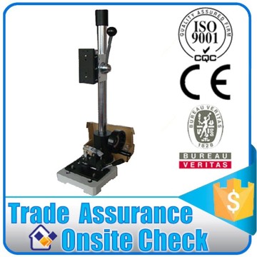 Button tensile tester