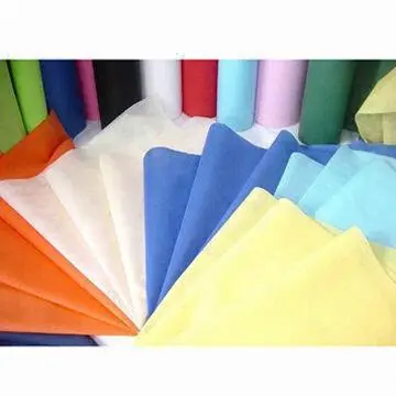 Hot air through spunbond nonwoven fabric for diaper