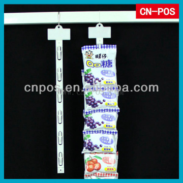 supermarket combining hanging strips for display on shelf
