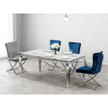 Juego de comedor moderno de mármol con sillas de terciopelo