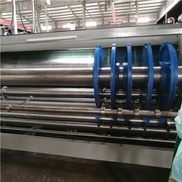 Macchina automatica per la produzione di scatole di cartone per slotter
