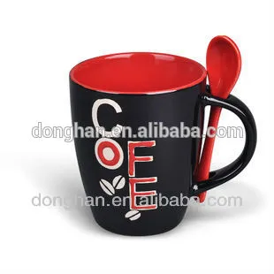 colored ceramic coffee mug with spoon