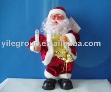 Santa Claus with bell and candles