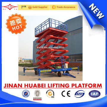 Four wheel mobile scissor lift platform