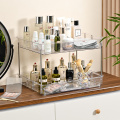 Estante organizador de almacenamiento de cosméticos de plástico transparente de 2 niveles