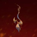 Les boucles d'oreilles "Dancing Fire" sont appliquées