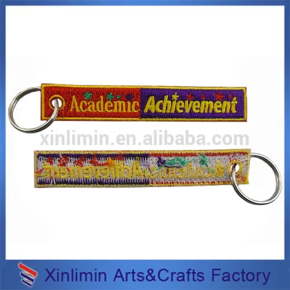 Factory wholesale newest design 100% pvc tag embroidered brand patches