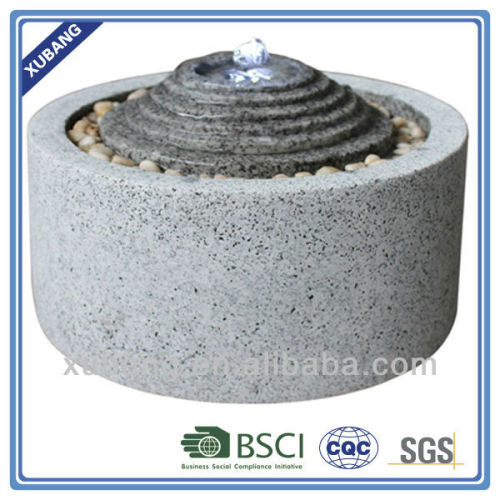 sandstone ribbed cone shape with marble finish round base fountain