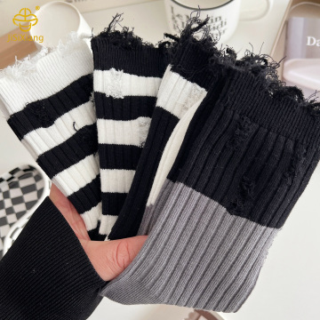 Black and white striped hole beggar socks