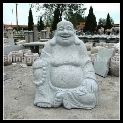 smiling stone buddha sculpture