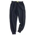 Pantaloni sportivi da uomo larghi in PVC con coulisse