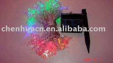 solar holiday light string with butterfly