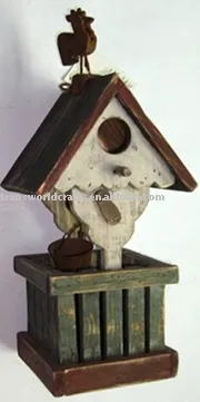 wooden bird house with painting