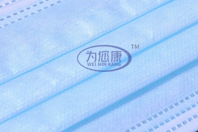 Disposable three-layer protective mask
