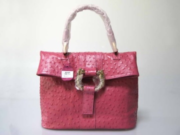 Fashion designer handbag in ostrich texture