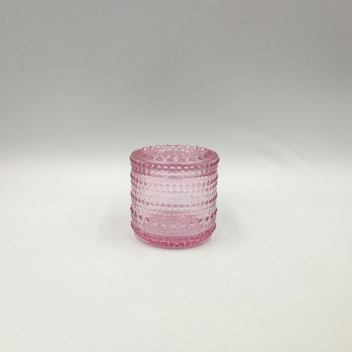 Rosafarbenes Mini-Glas mit Perlenmuster für Kerze