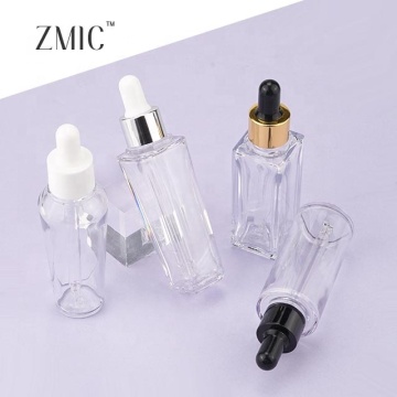 Bottiglie di contagocce quadrate e rotonde con teste di gomma in bianco e nero per imballaggi cosmetici