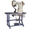 Machine à coudre à semelle intérieure