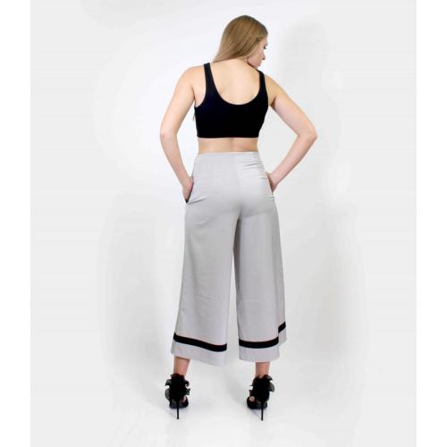 Pantalones estilo carpi de corte holgado con lazo en la parte delantera