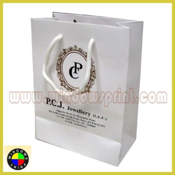 White kraft paper bag with rope handles
