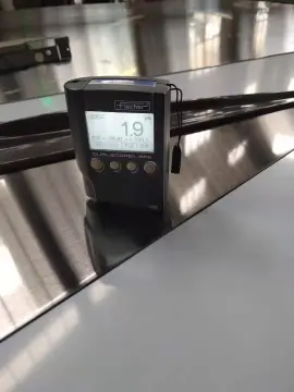 Stainless steel ink brushed plate