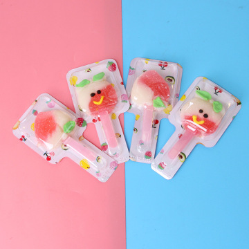 Sour & Spicy White Peach Gummy Lollipops with Salty & Bitter Flavors in Cartoon Packaging