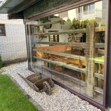 Slide alla moda e girare la finestra di balcone in vetro senza telaio