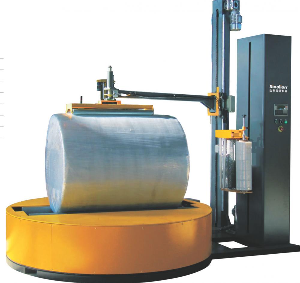 Round roller type wrapping machine with stretch film