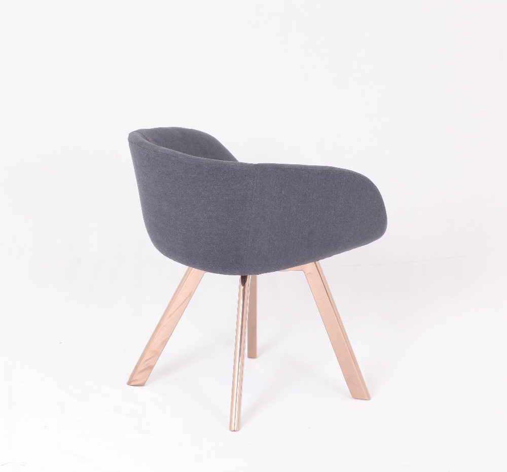 Gold leg Tom Dixon dining chair