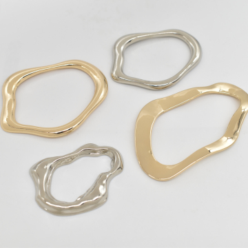 Connettori hardware in metallo a forma irregolare di alta qualità all'ingrosso per eleganti costumi da bagno di lusso, bikini e set di reggiseno-design resistente alla ruggine