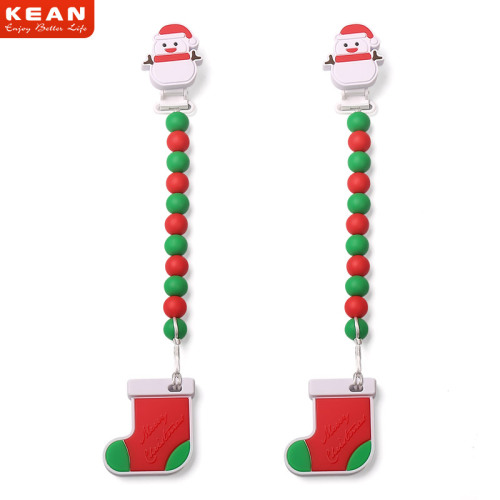 Grampo barato do suporte da chupeta do silicone do Natal da promoção, grampo do Pacifier do bebê