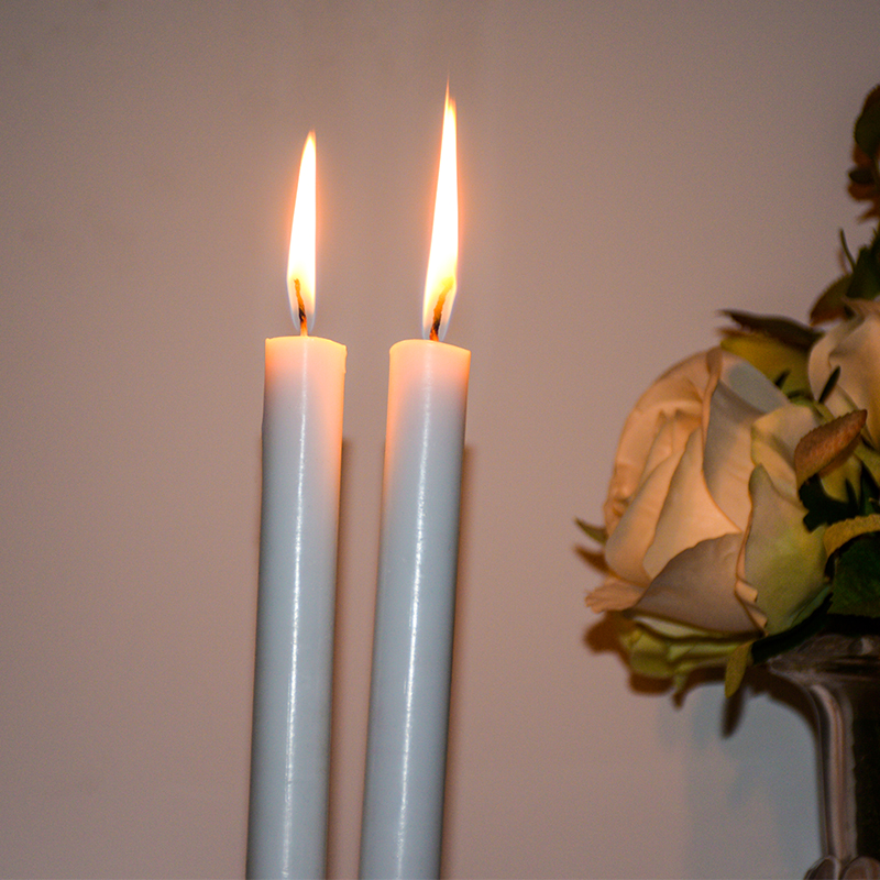 white taper candle 