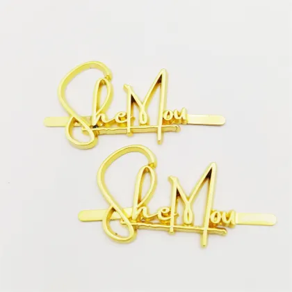 Golden Handbag with Metal Letters and Prong Backing