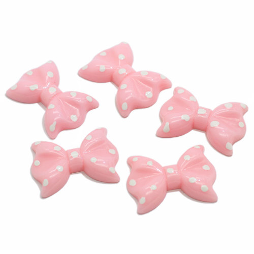 Hot Selling Flat Back Pink Bowknot geformte Harz Cabochon für handgemachte Handwerk Dekoration Perlen Charms