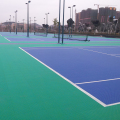 Scuola di pavimenti in campo da tennis blu e verde che utilizzano