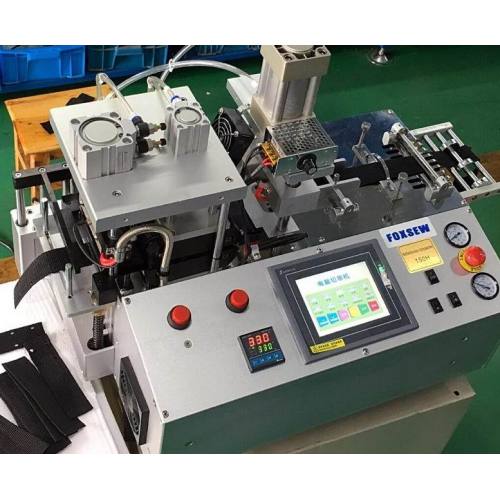 Coupe-ruban automatique à couteau chaud avec perforateur