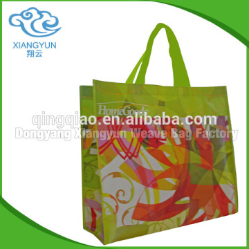 Laminated promotion cheap custom pp shopping bags band