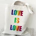 प्यार प्यार प्रिंट इंद्रधनुष कैनवास टोट बैग है