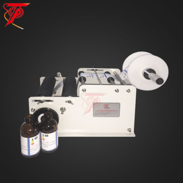 Applicatore per etichetta per bottiglia manuale per lattine di tonno
