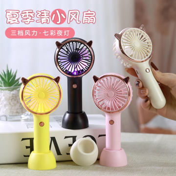 The demon holds a handheld fan (LED)