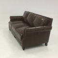 Three person shiny leather sofa