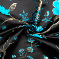 Felgroene bloemen jacquard stof