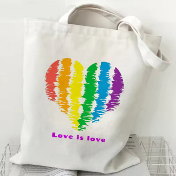 प्यार प्यार प्रिंट इंद्रधनुष कैनवास टोट बैग है