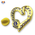 Badge sacchetto in metallo oro a forma di cuore