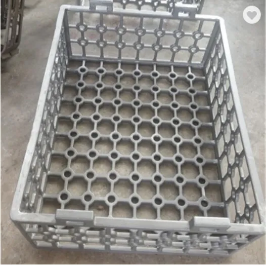 Heat resistant cast charging baskets