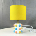 Resin base fabric shade decorative table lamp