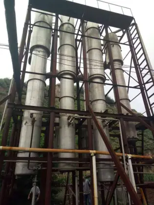 Rotary scraper film evaporator